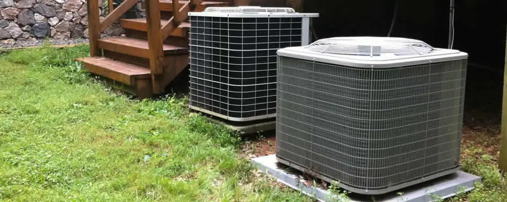 Heat pump installation and service units outside a home in Louisville, KY