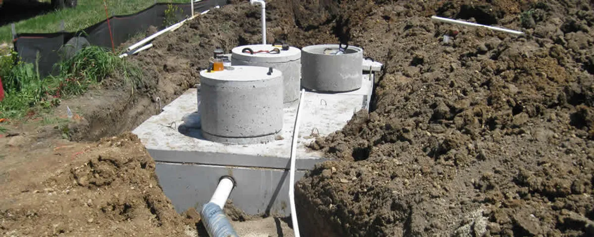 Septic system repair and installation site with tank access ports in Louisville, KY